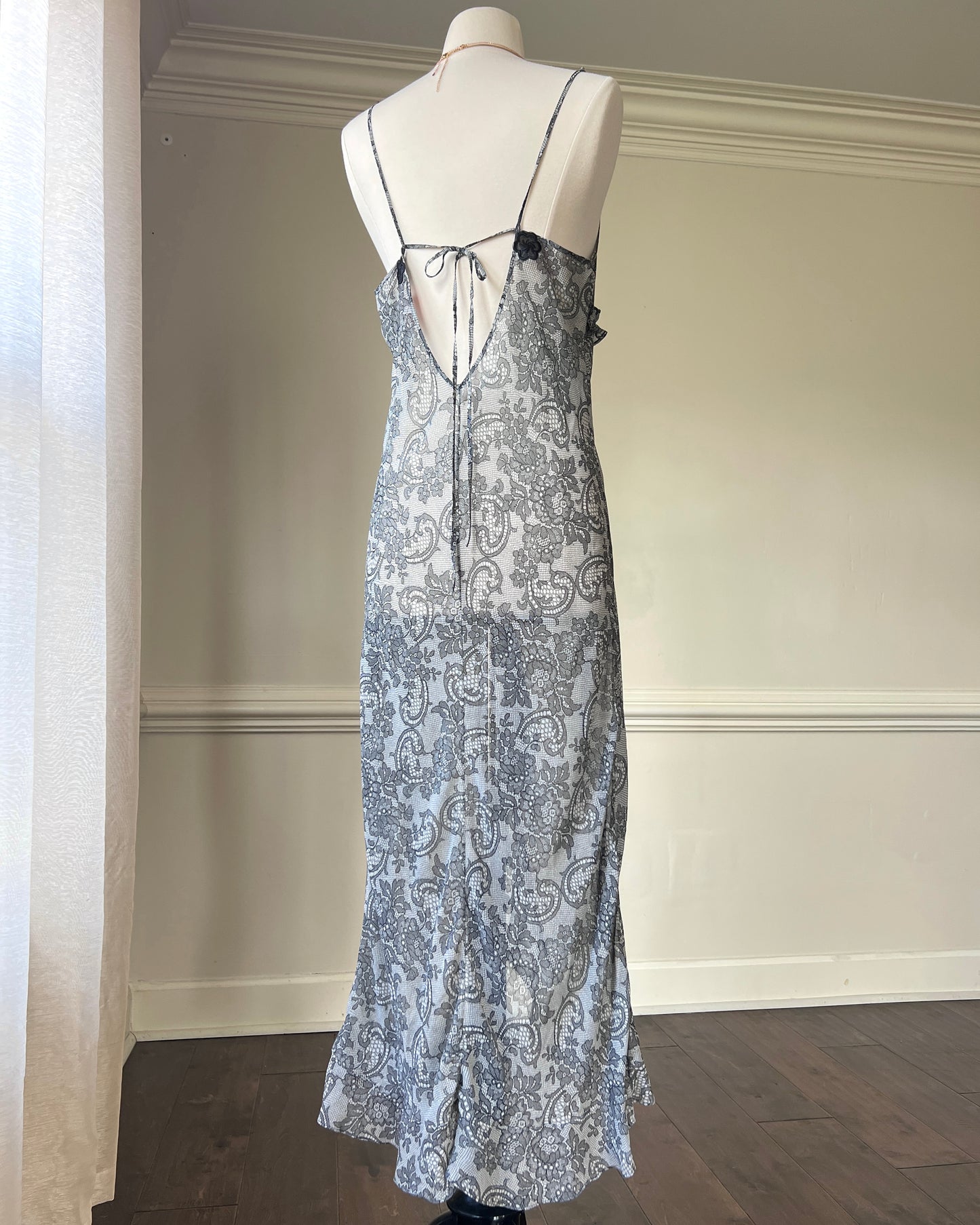 Eblin’s Sheer Maxi Dress featuring Overall Paisley Pattern with Ruffled Split Detail