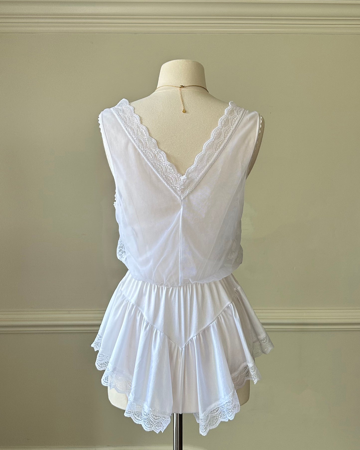 Sheer White Bodysuit featuring Delicate Sheer Lace Bodice with Flared Skirt