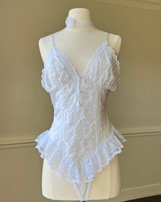 Angelic Laced Bodysuit featuring satin Lace Crisscross Detail with Ruffled Skirt Fringe