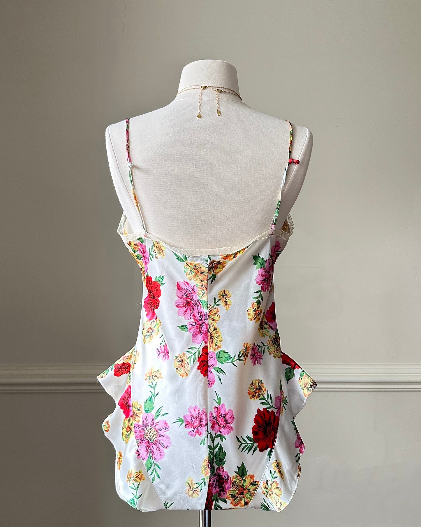 Victoria’s Secret’s Feminine Satin Bodysuit featuring Vibrant Floral Prints