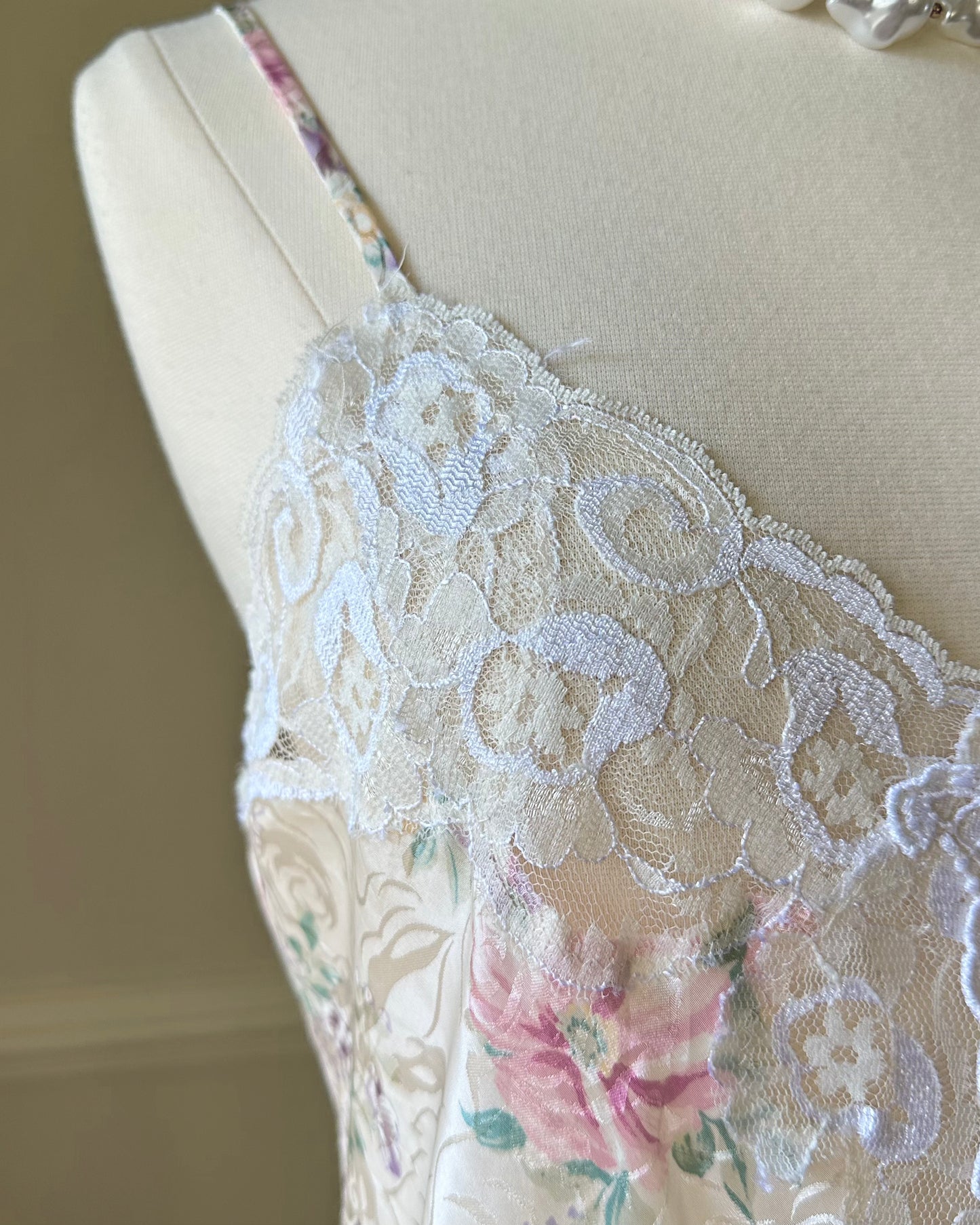 Vintage ivory satin slip dress with a bold pastel floral print