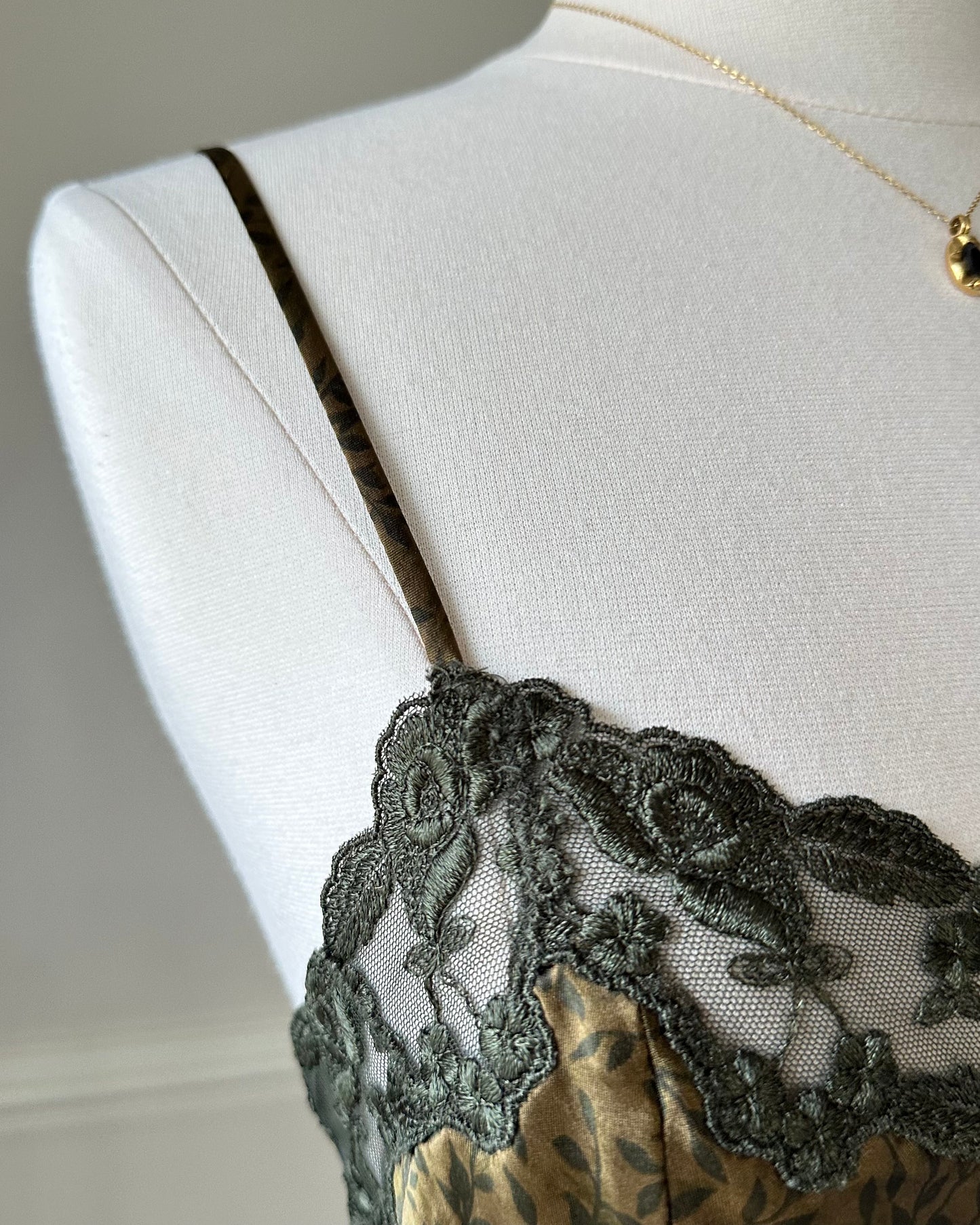 Victoria’s Secret vintage satin slip dress featuring leaf vines print on gold fabric