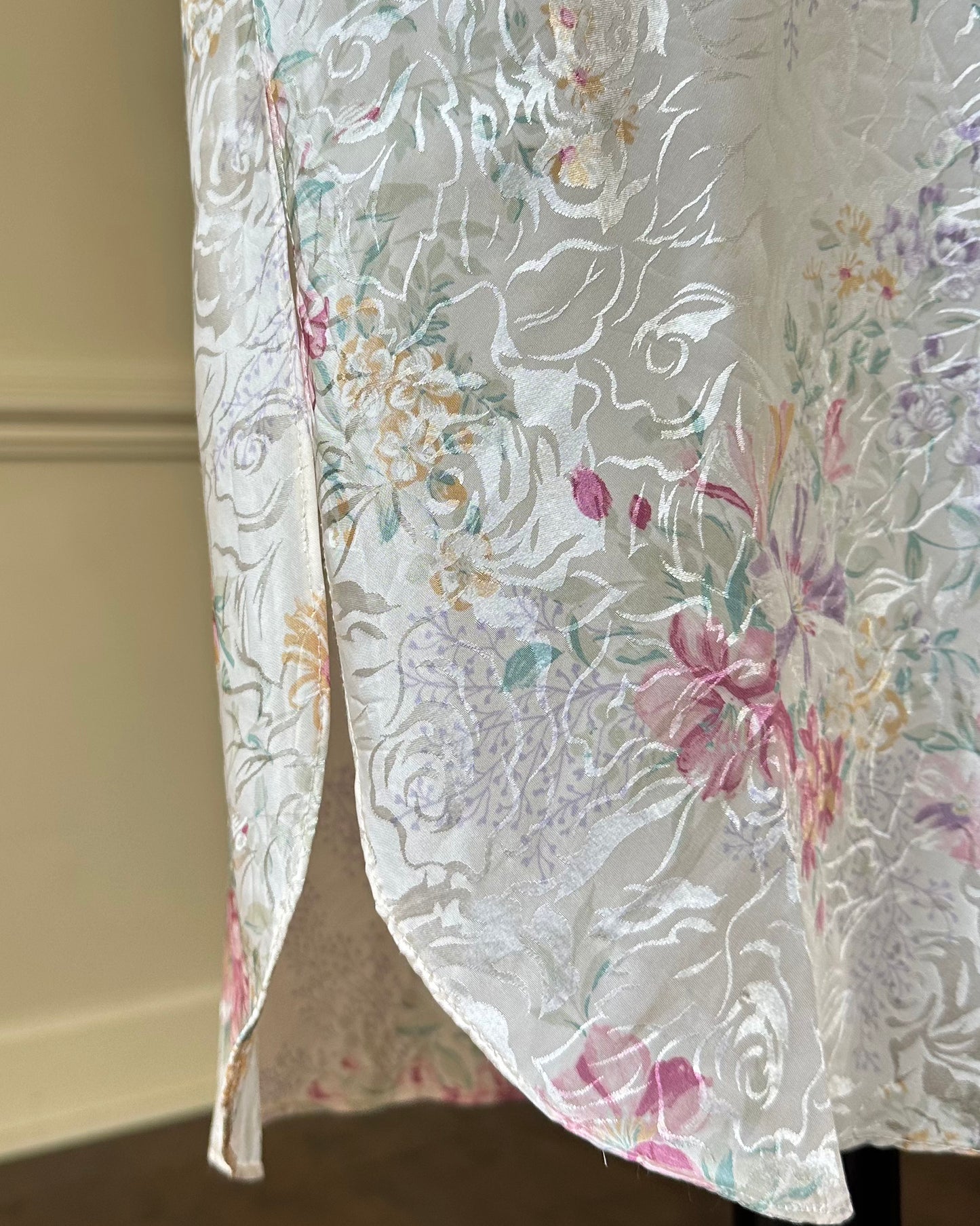 Vintage ivory satin slip dress with a bold pastel floral print