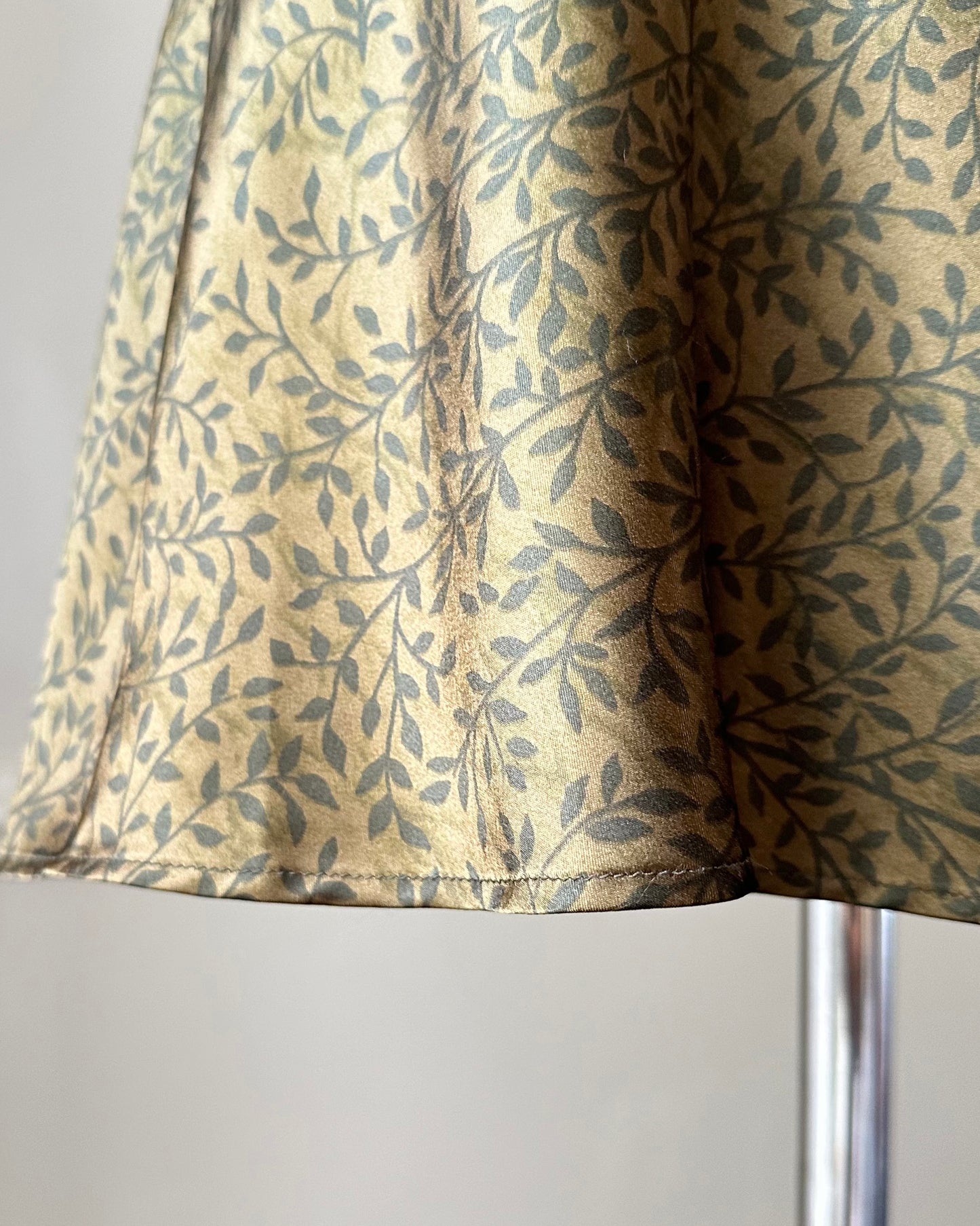 Victoria’s Secret vintage satin slip dress featuring leaf vines print on gold fabric