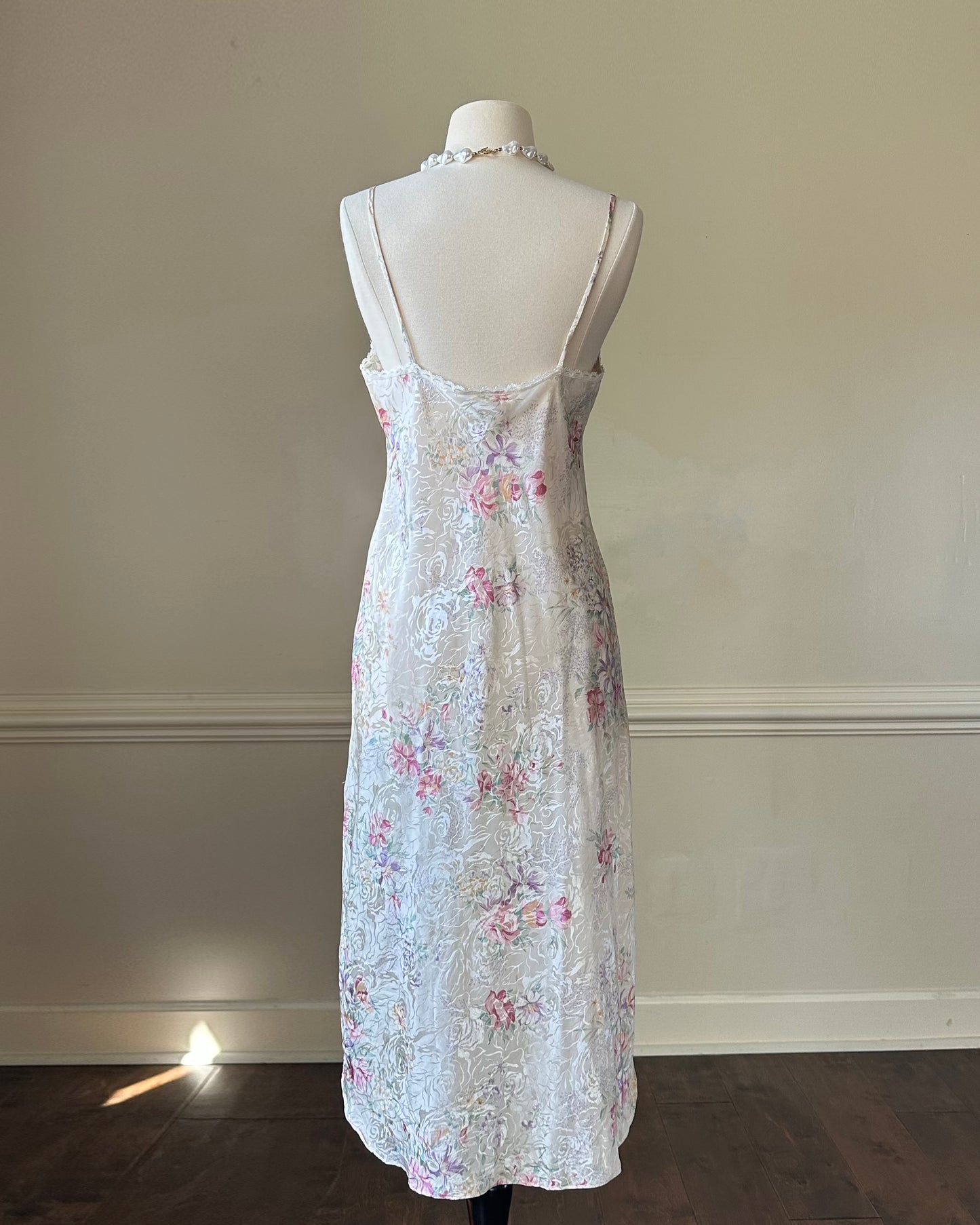 Vintage ivory satin slip dress with a bold pastel floral print