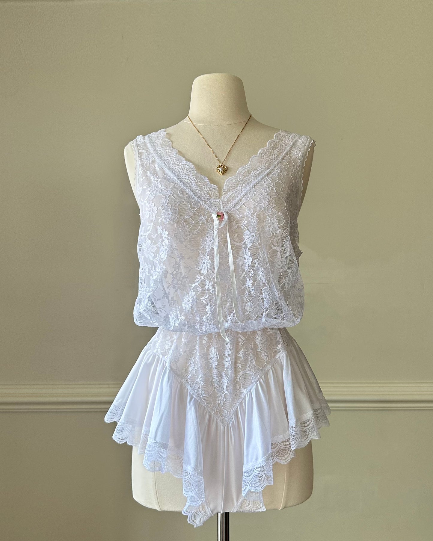 Sheer White Bodysuit featuring Delicate Sheer Lace Bodice with Flared Skirt