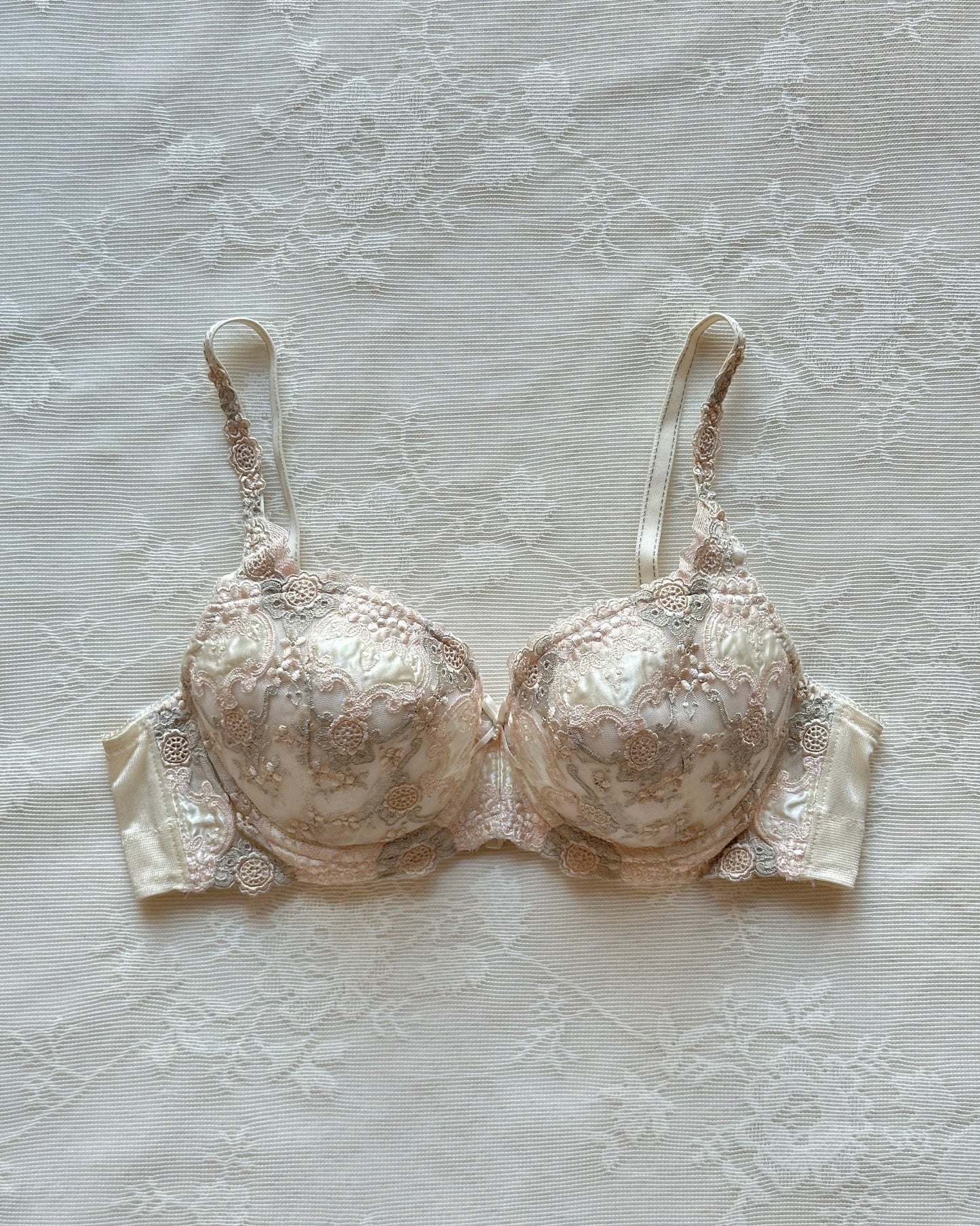 Vintage cream Japanese brassiere featuring neutral intricate embroidered