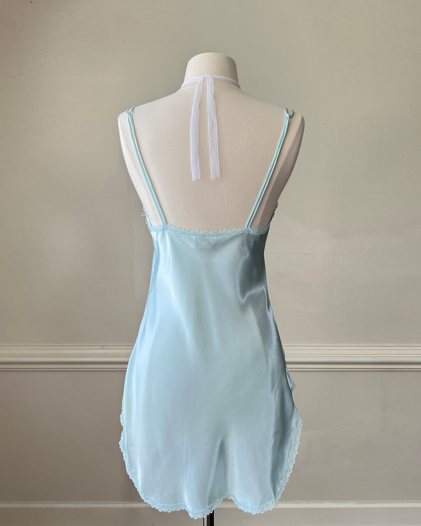 Vintage Victoria’s Secret baby blue mini slip with rosebud detail