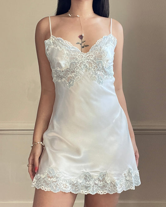 Vintage Victoria’s Secret ivory satin mini slip with blue lace