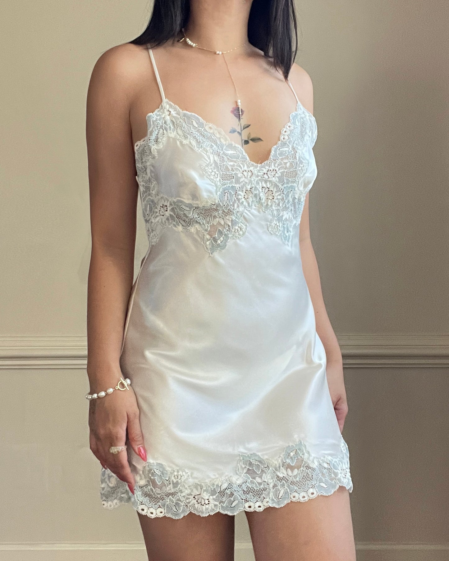 Vintage Victoria’s Secret ivory satin mini slip with blue lace