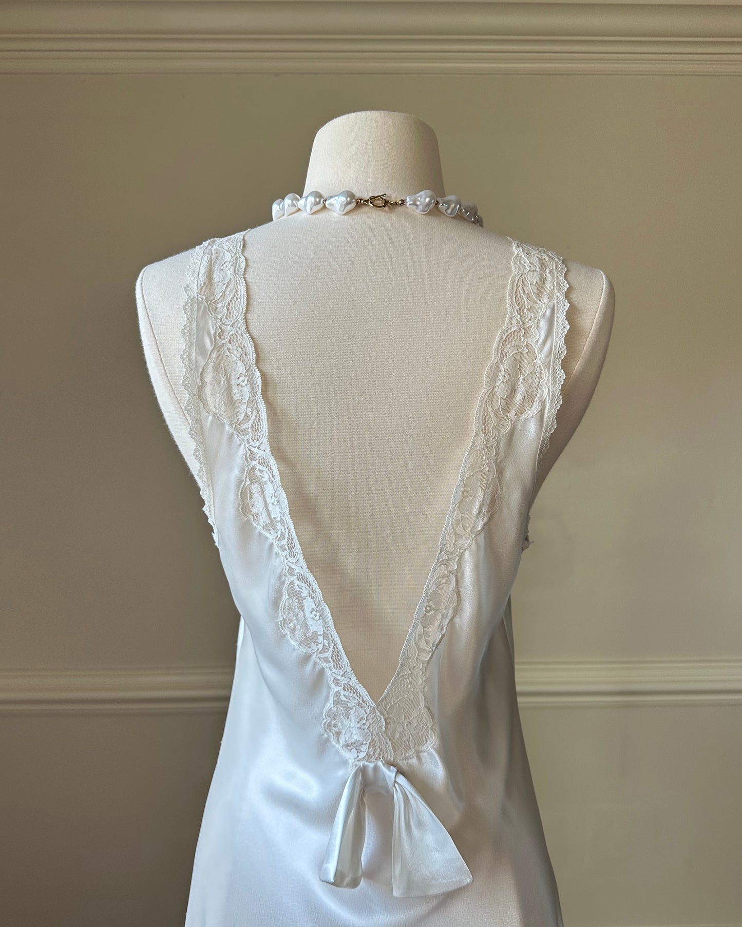 Vintage ivory satin slip dress with high neck and dreamy lace details