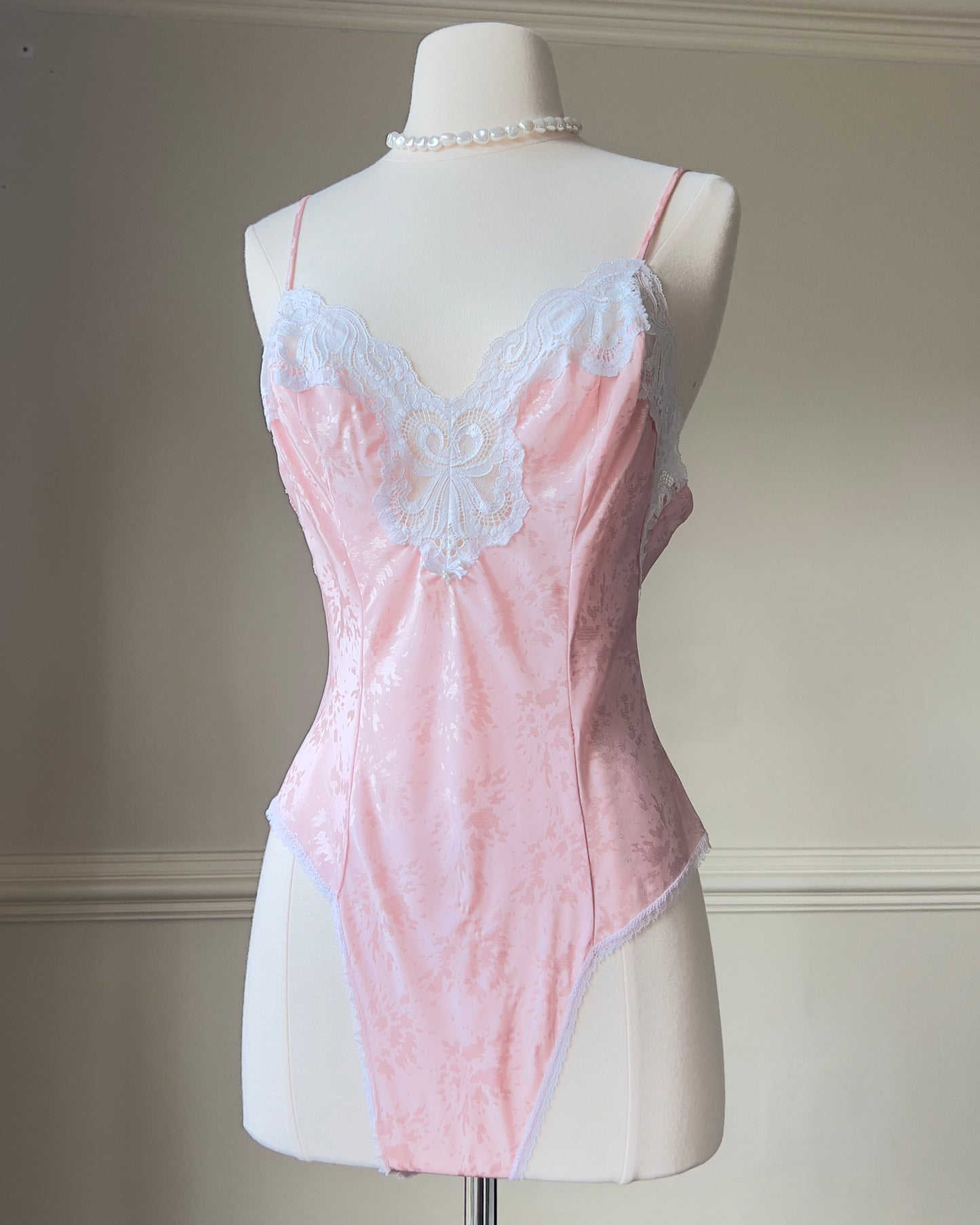 Baby Blushed Bodysuit featuring Lace Trimmings Detail with Embossed Patterned Fabric