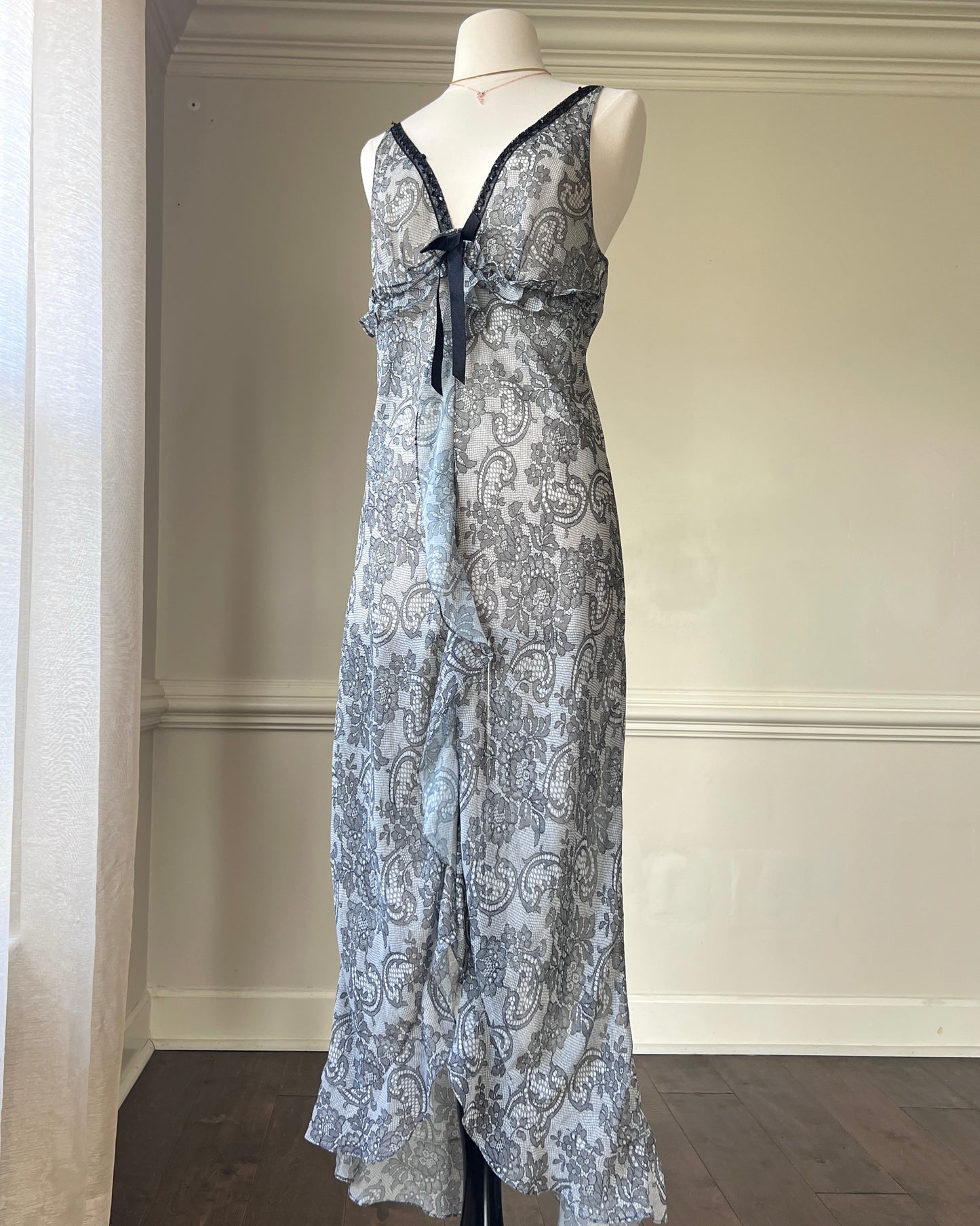 Eblin’s Sheer Maxi Dress featuring Overall Paisley Pattern with Ruffled Split Detail