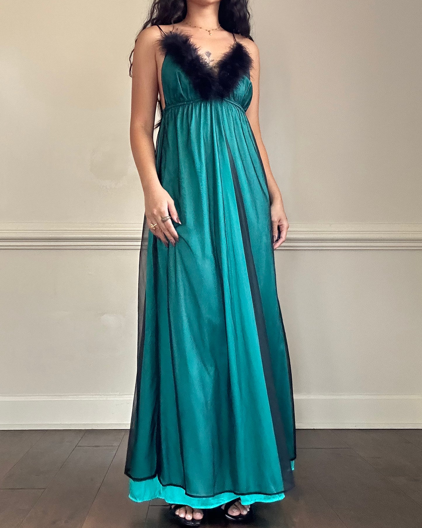 Emerald green maxi dress featuring sheer black mesh layout