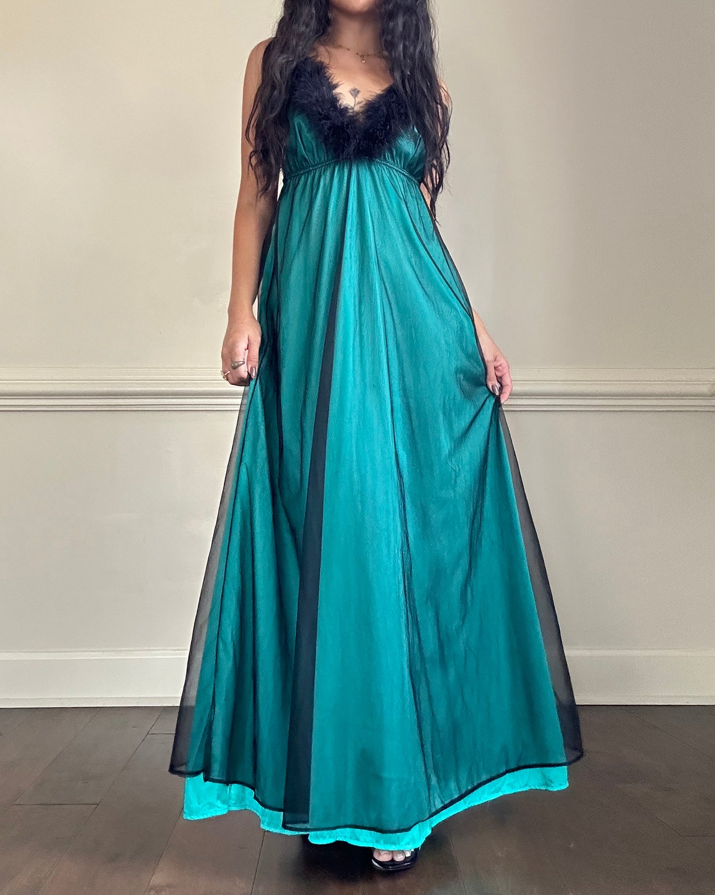 Emerald green maxi dress featuring sheer black mesh layout