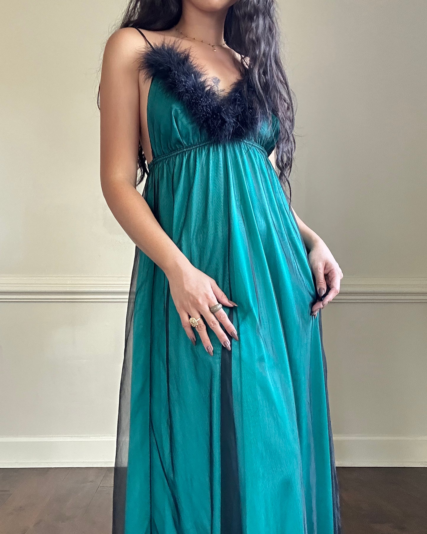 Emerald green maxi dress featuring sheer black mesh layout