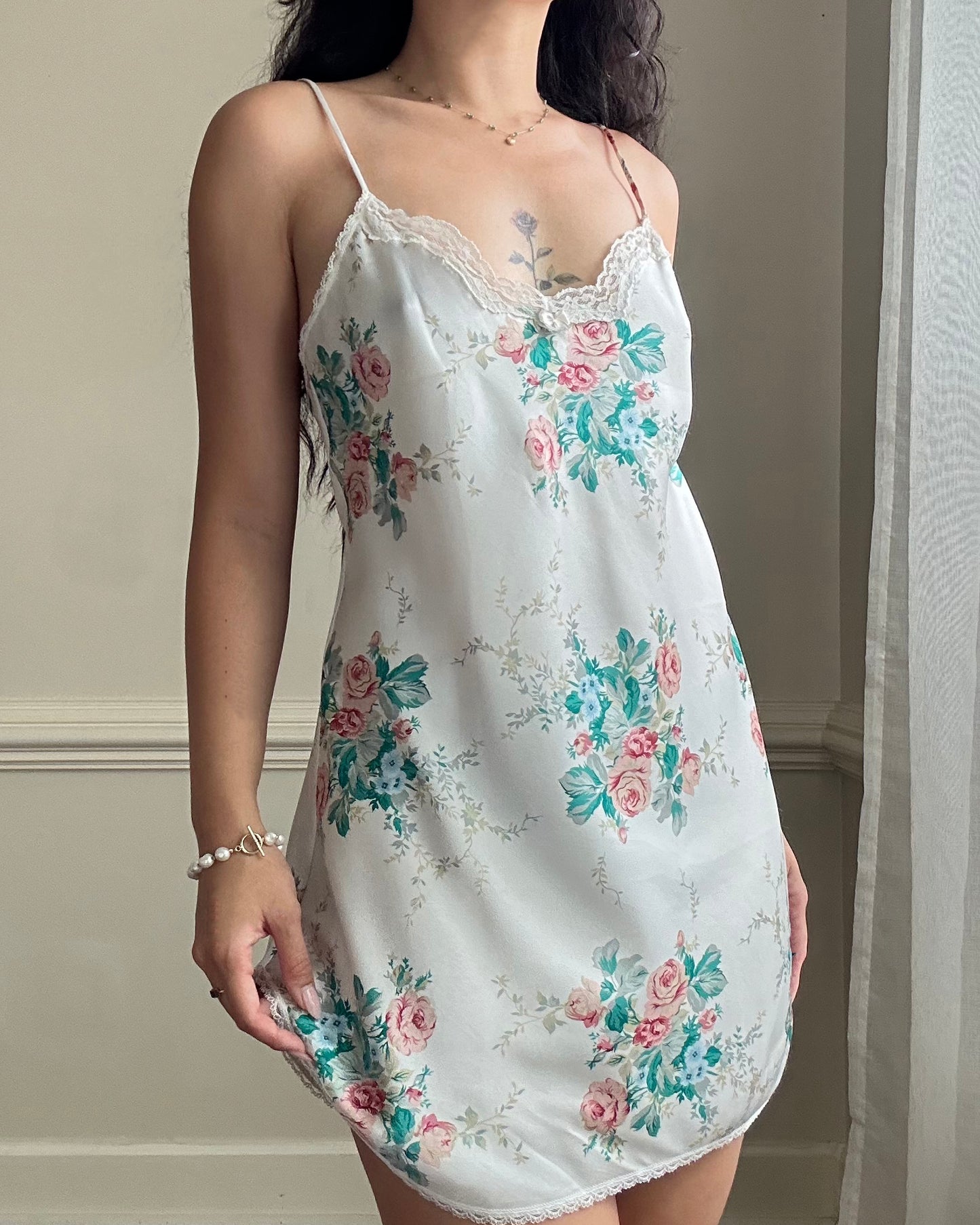 Vintage satin slip dress in white featuring bouquets of roses print