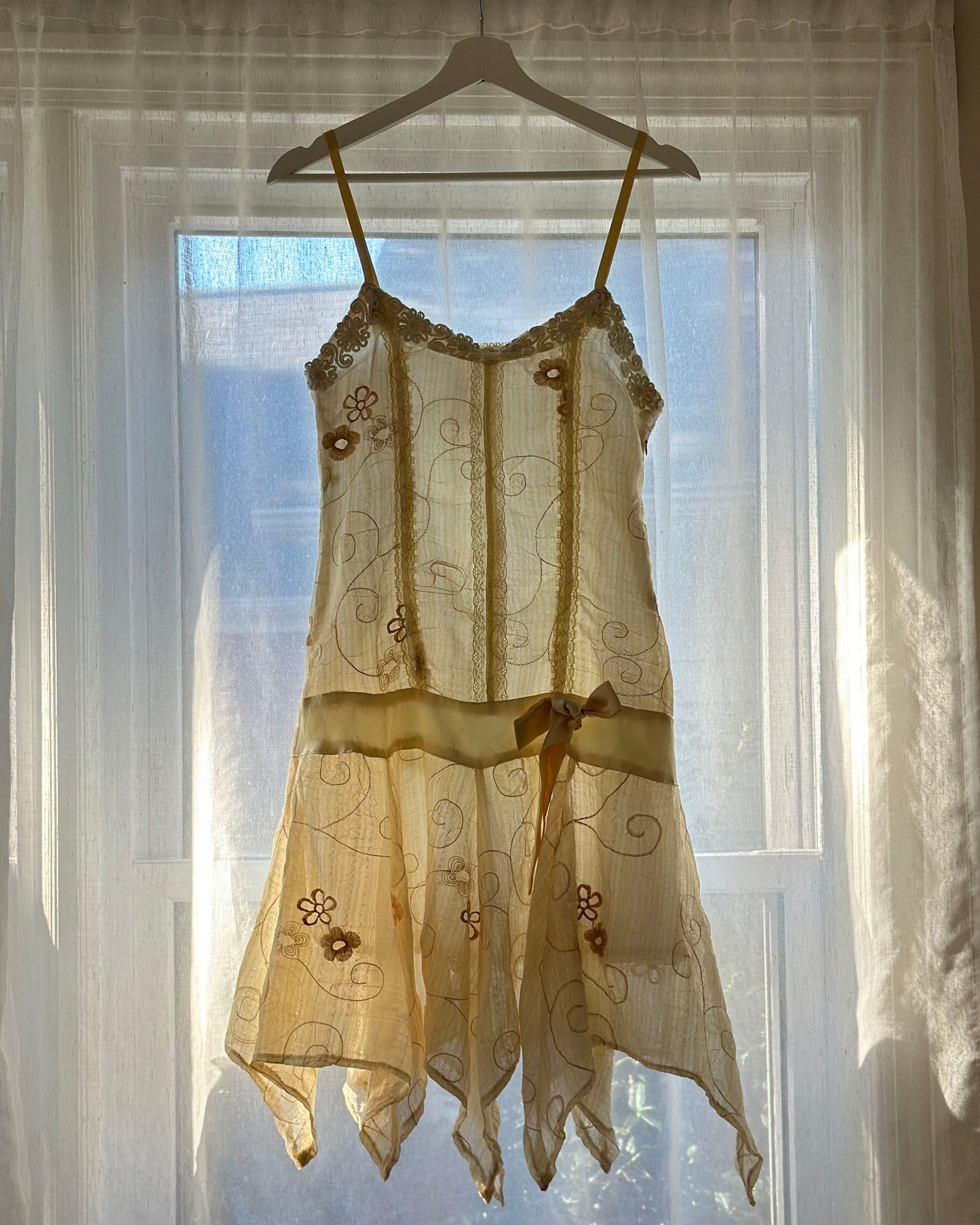 Vintage muslin cloth sundress featuring daisy embroidery details with fairy skirt