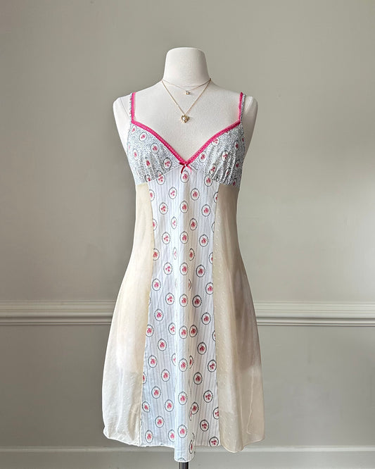 Vintage White slip dress featuring rosette pattern bodice with laced bustier trimmings