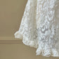 Vintage ivory lace slip dress with a romantic allover floral pattern