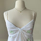 Victoria’s Secret sheer white open top featuring flower bouquets embroidery