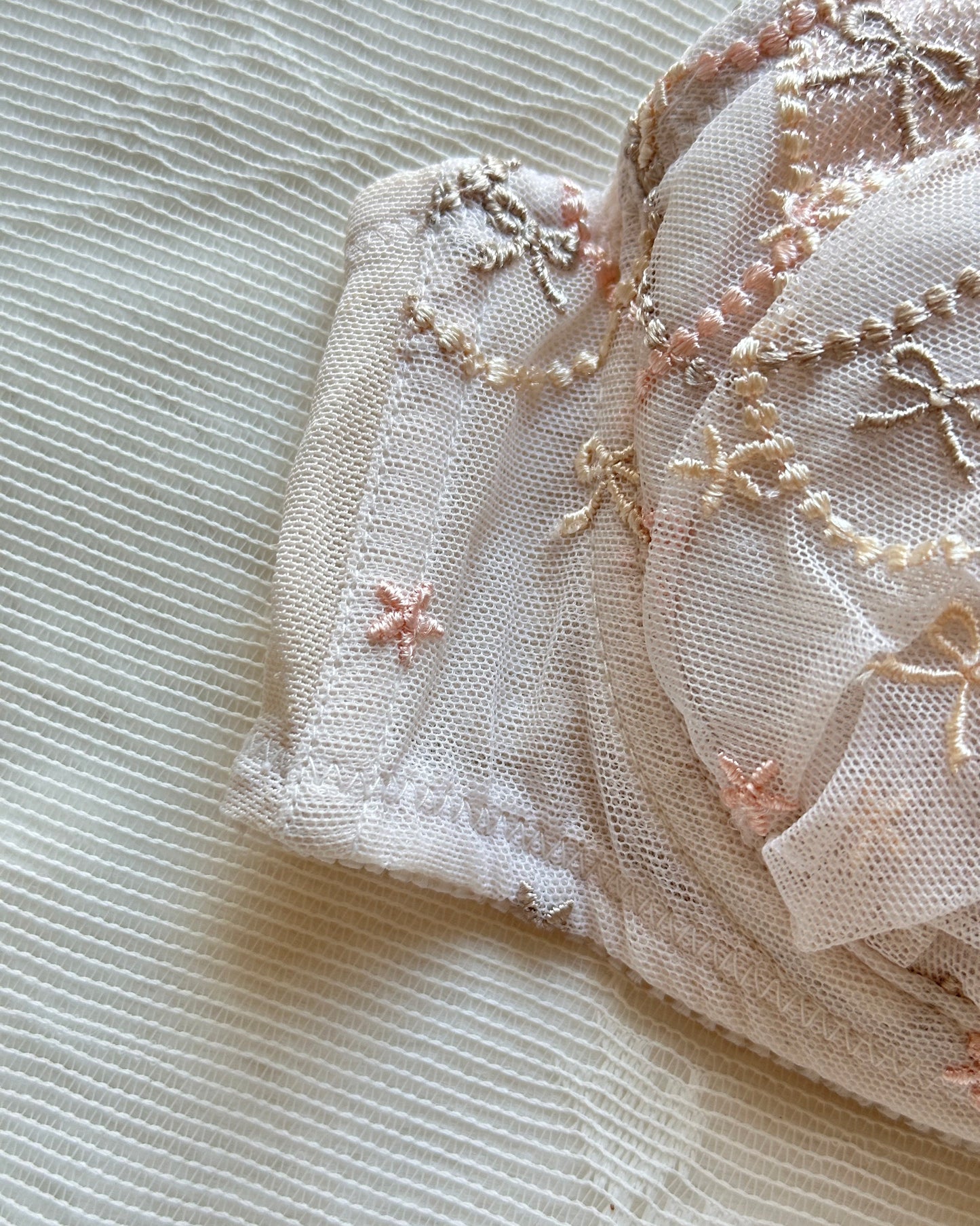 Vintage white Japanese brassiere featuring adorable bows embroidery