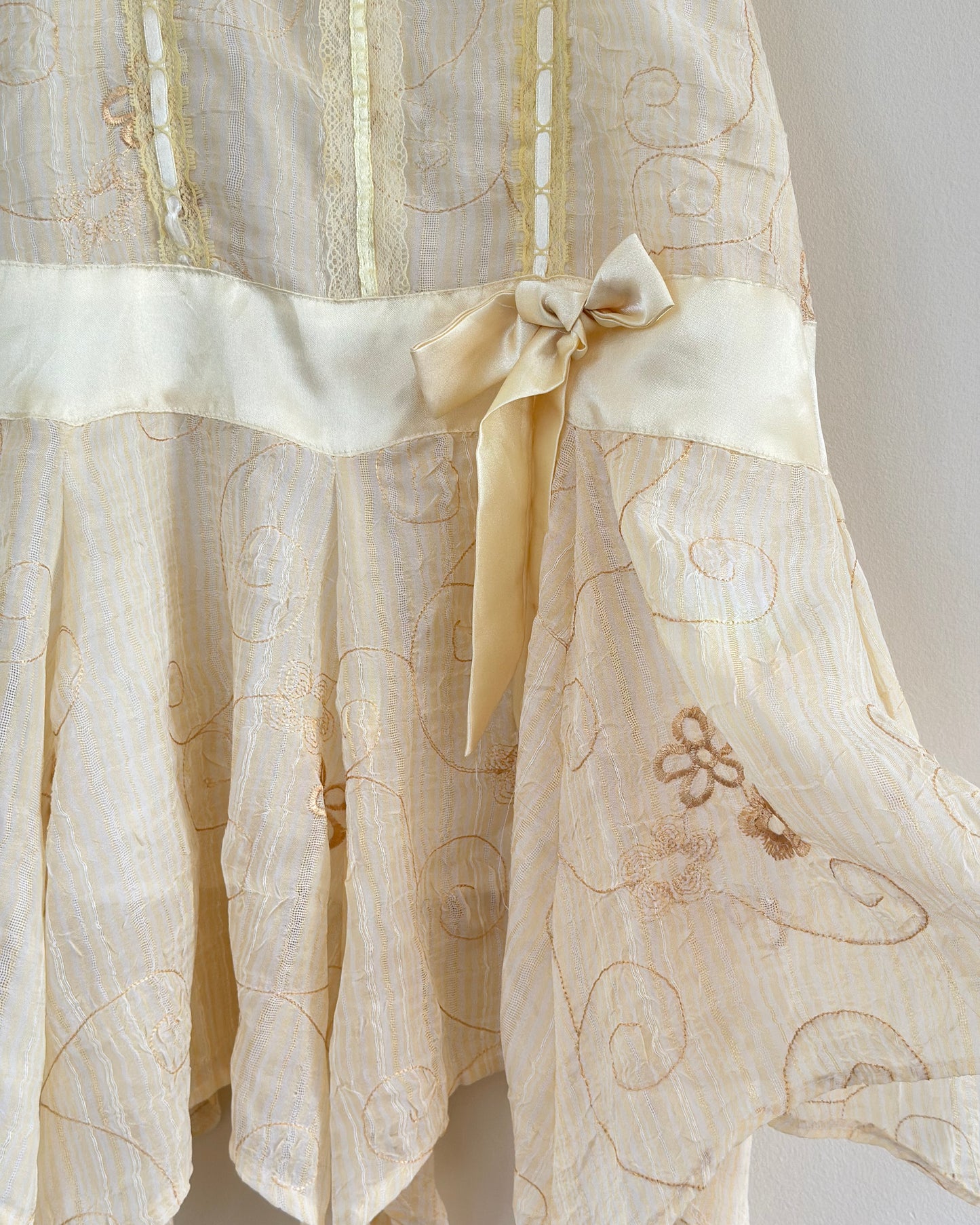 Vintage muslin cloth sundress featuring daisy embroidery details with fairy skirt