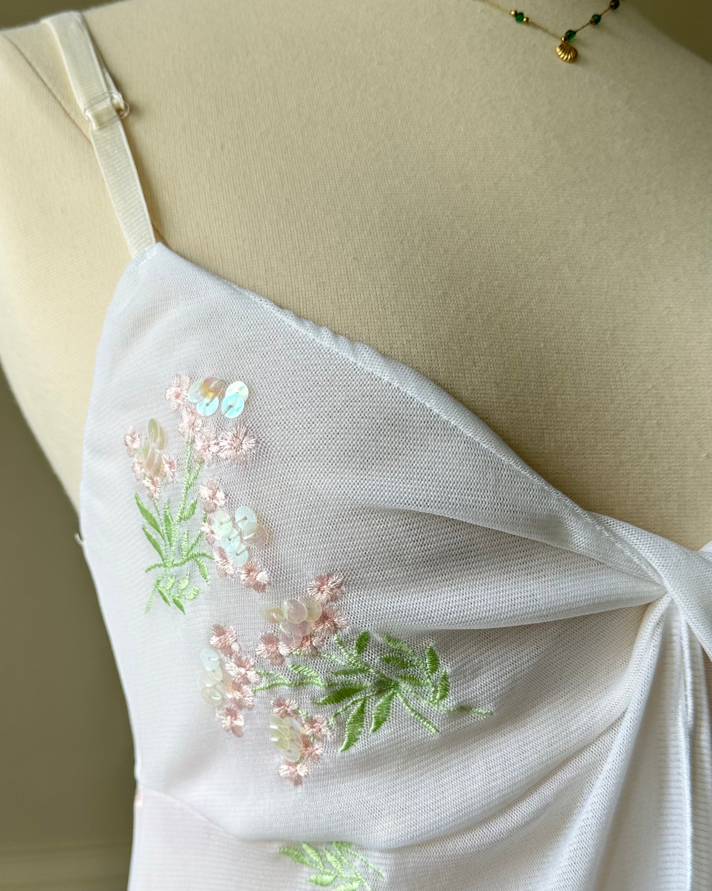 Victoria’s Secret sheer white open top featuring flower bouquets embroidery