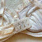 Vintage white Japanese brassiere featuring adorable bows embroidery