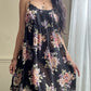 Valmode semi sheer black slip dress featuring vibrant peonies print