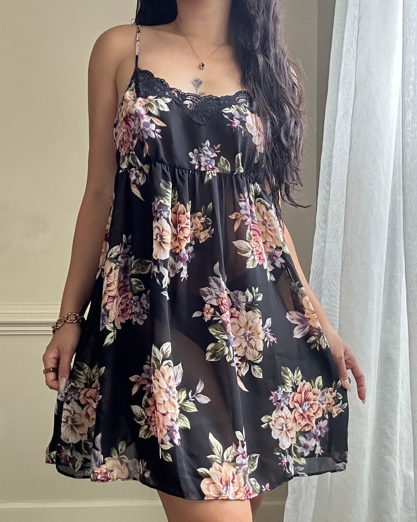 Valmode semi sheer black slip dress featuring vibrant peonies print