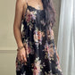 Valmode semi sheer black slip dress featuring vibrant peonies print