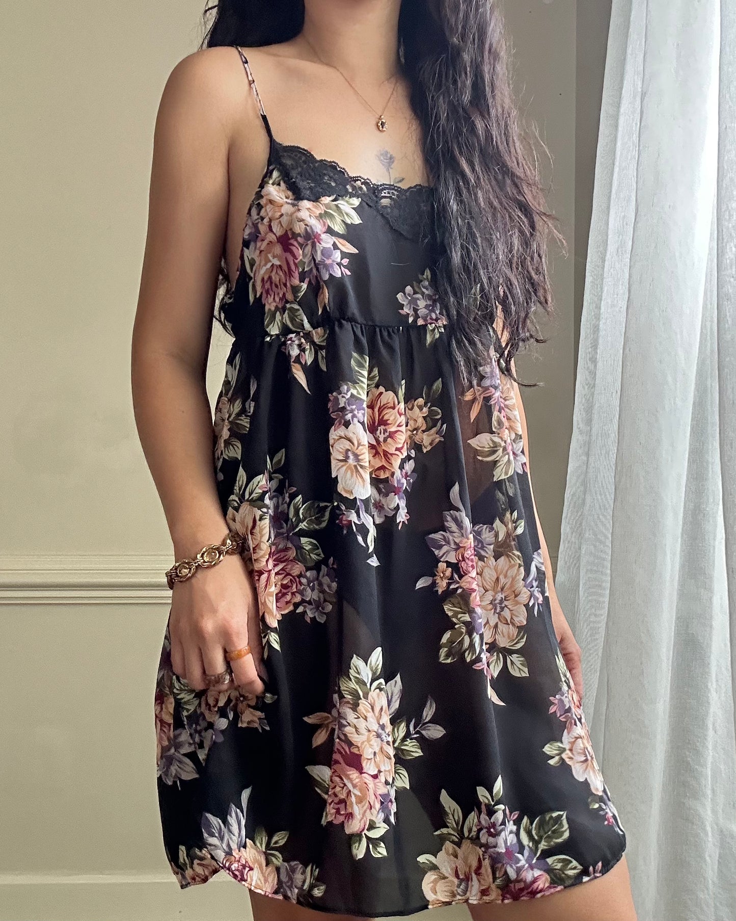 Valmode semi sheer black slip dress featuring vibrant peonies print