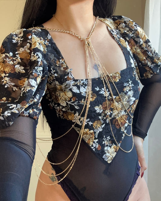Unique Bodysuit featuring Sheer Black Fabric and Floral Patterned Sleeves