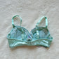 Turquoise blue Japanese brassiere featuring blue and lavender petite flowers embroidery