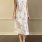 Vintage ivory satin slip dress with a bold pastel floral print