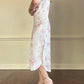 Vintage ivory satin slip dress with a bold pastel floral print