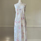 Vintage ivory satin slip dress with a bold pastel floral print