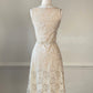 Vintage embroidery in warm beige midi dress featuring floral embroidery