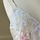 Vintage ivory satin slip dress with a bold pastel floral print