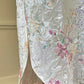 Vintage ivory satin slip dress with a bold pastel floral print
