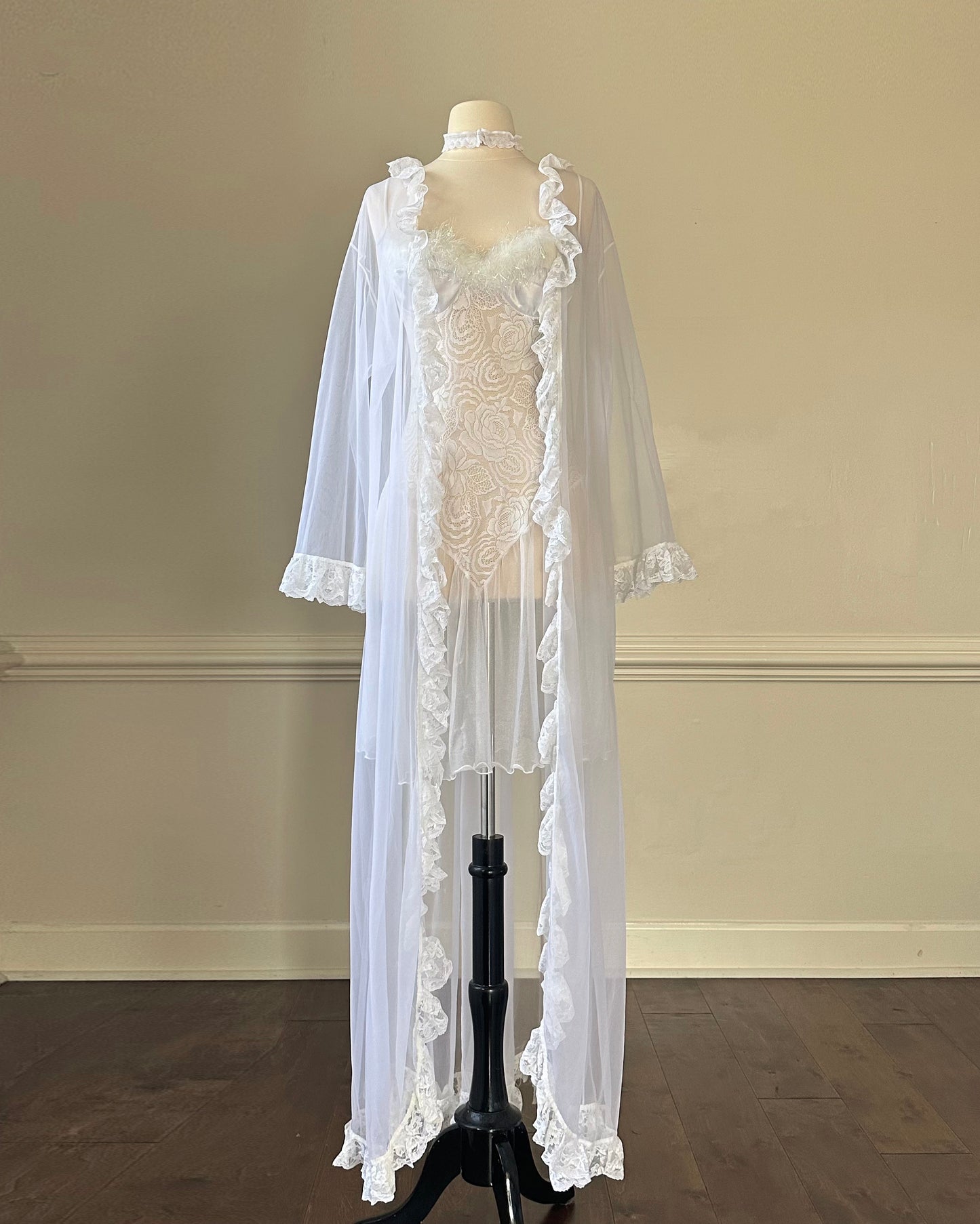 Sheer mesh maxi robe featuring floral embroidery ruffled sleeves and lining