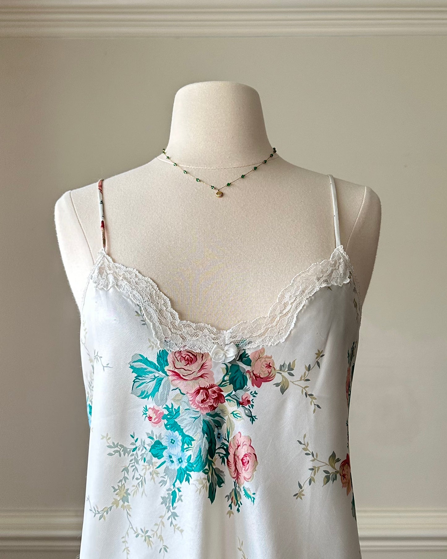 Vintage satin slip dress in white featuring bouquets of roses print