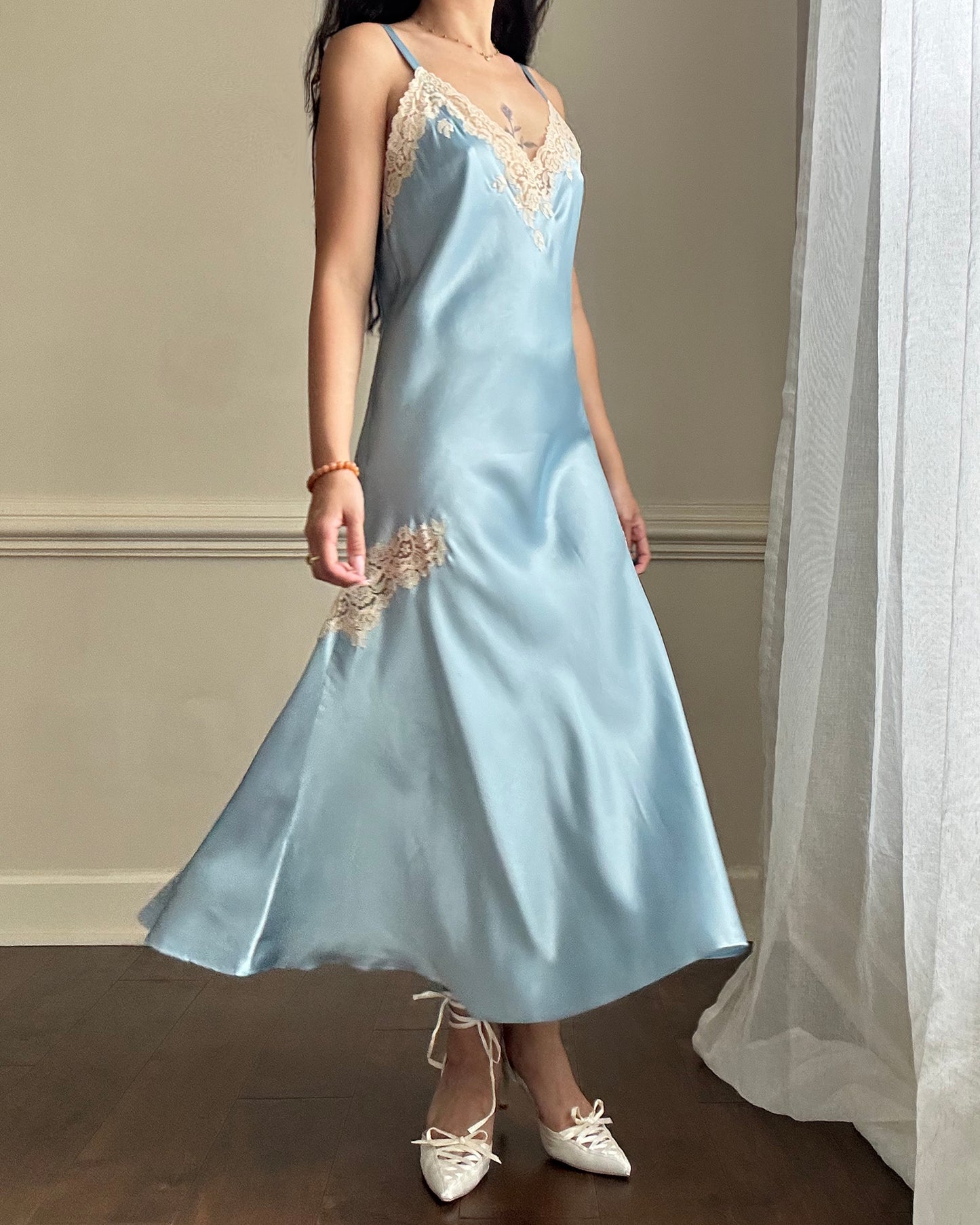 Ethereal sky blue satin maxi dress featuring rosettes embroidery bust