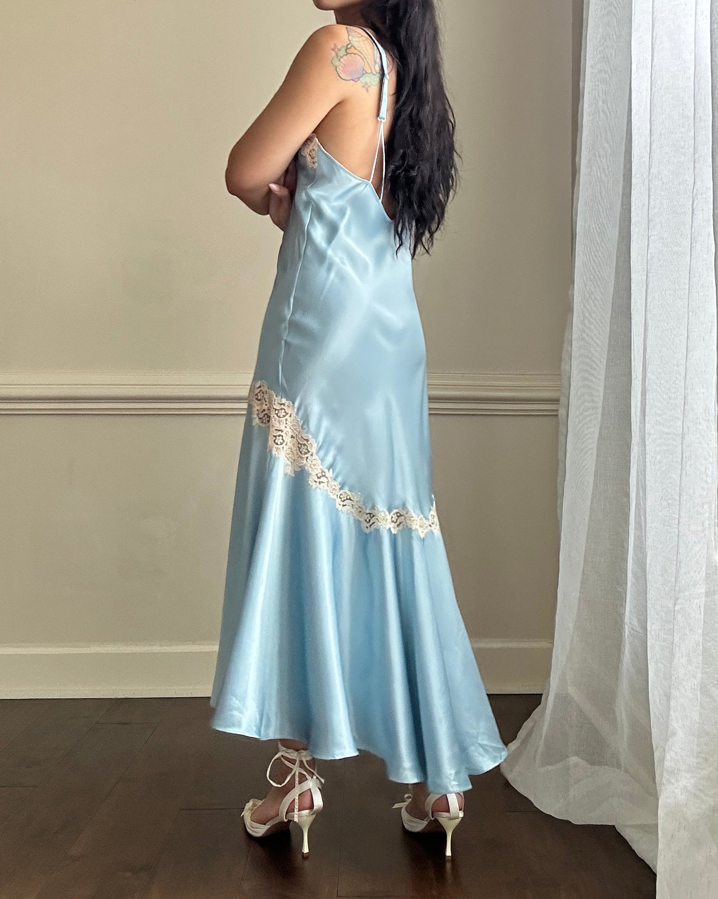 Ethereal sky blue satin maxi dress featuring rosettes embroidery bust