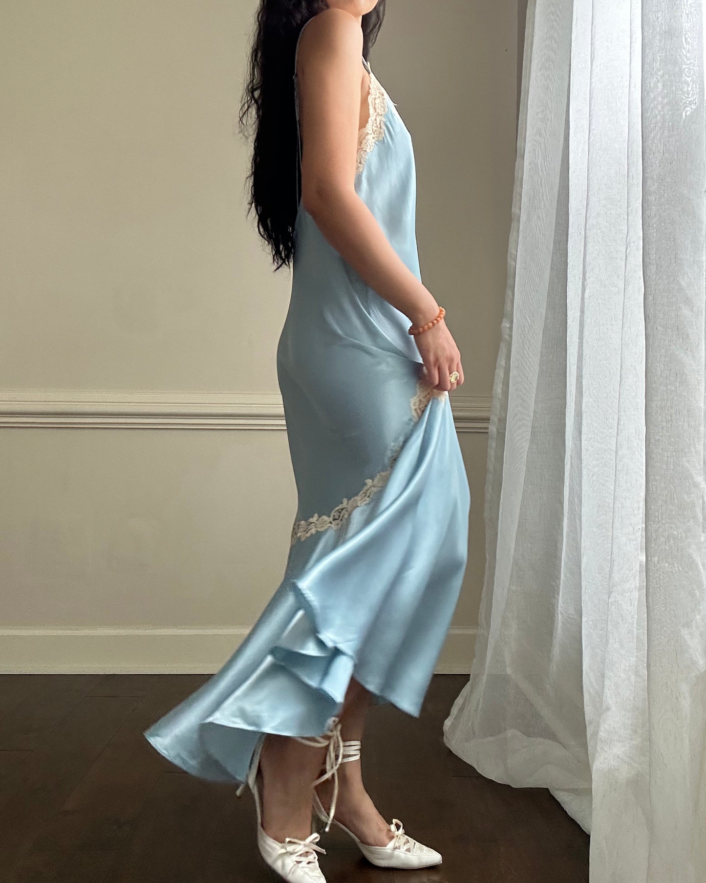 Ethereal sky blue satin maxi dress featuring rosettes embroidery bust