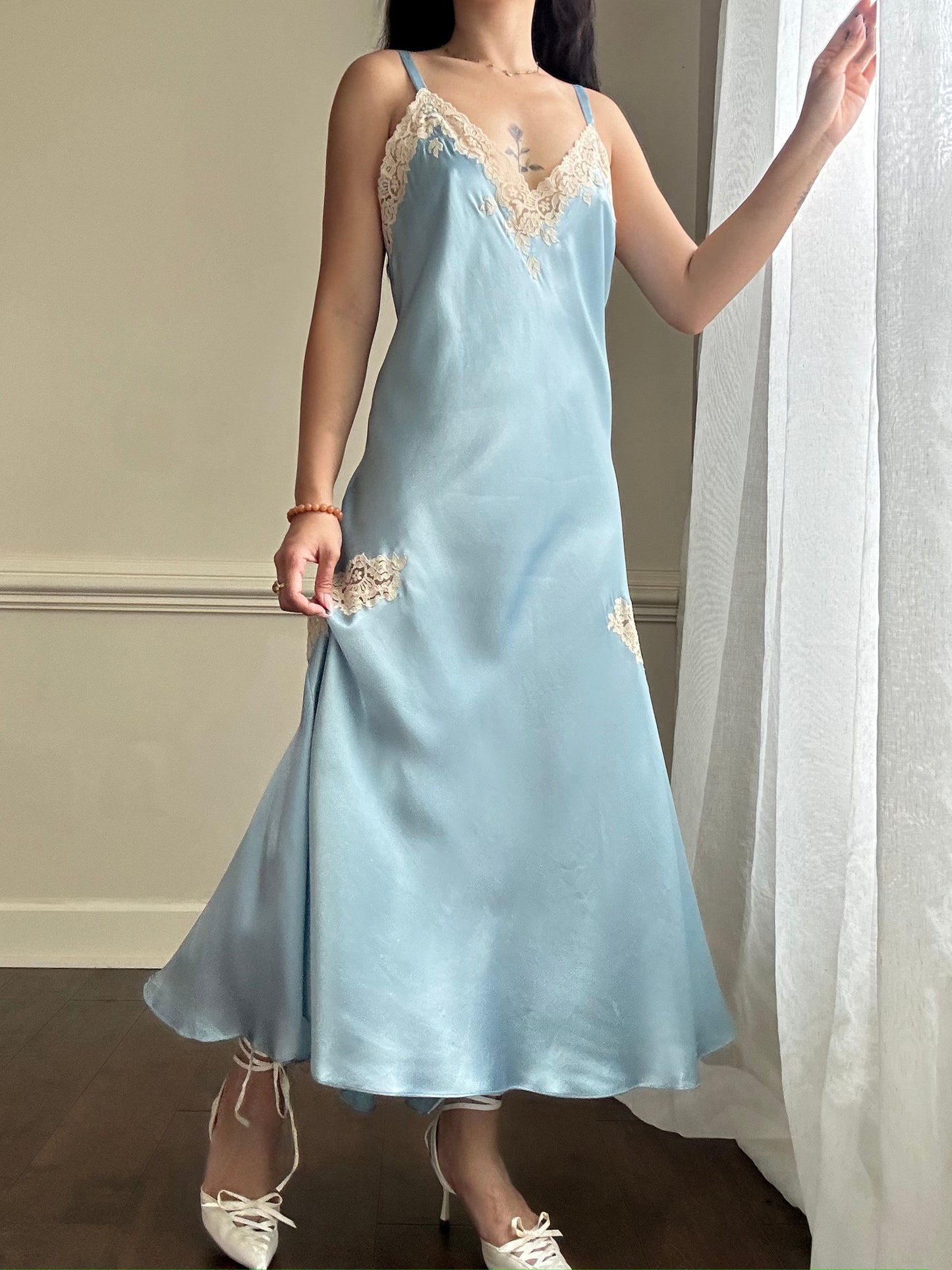 Ethereal sky blue satin maxi dress featuring rosettes embroidery bust