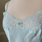 Vintage Victoria’s Secret baby blue mini slip with rosebud detail