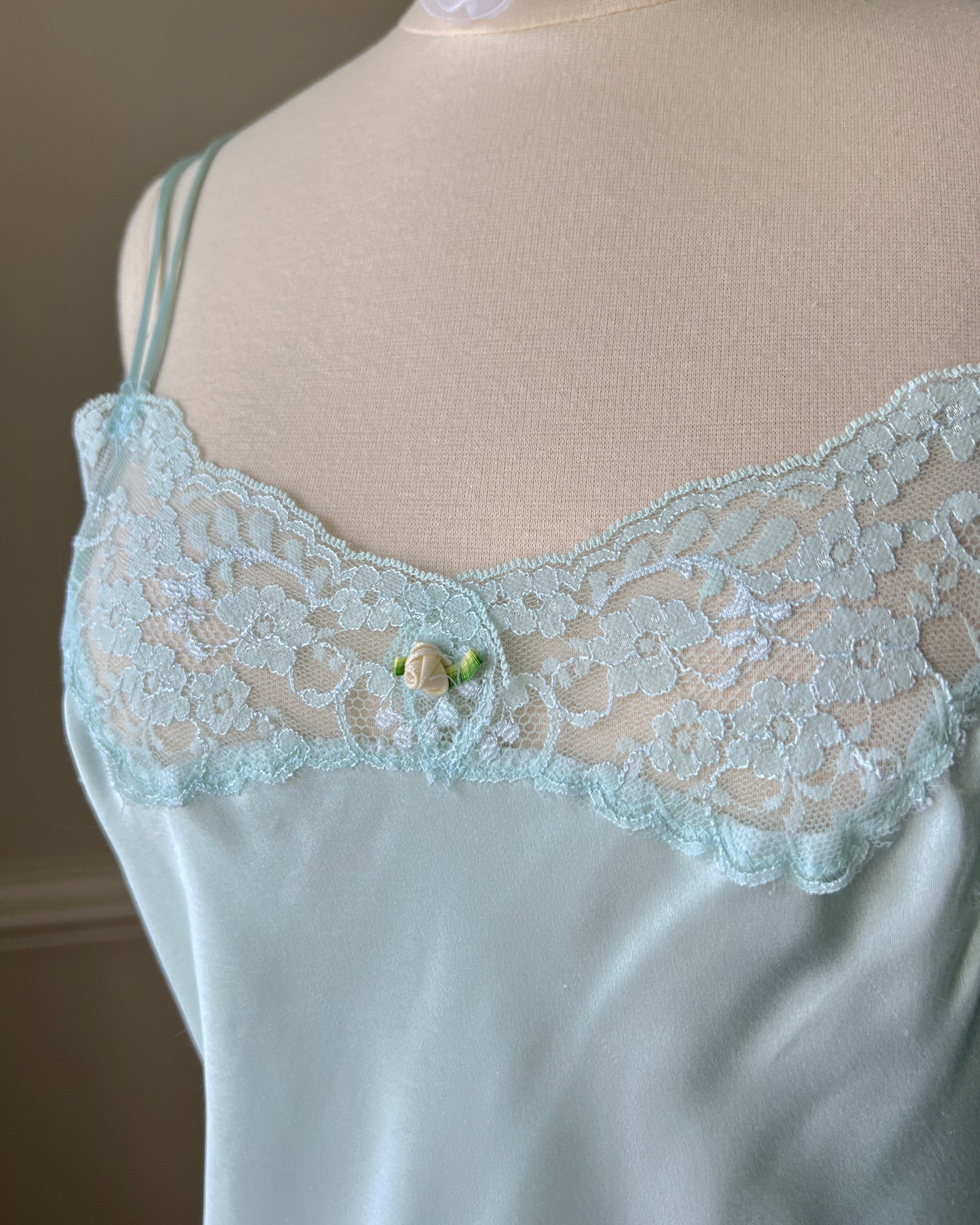Vintage Victoria’s Secret baby blue mini slip with rosebud detail