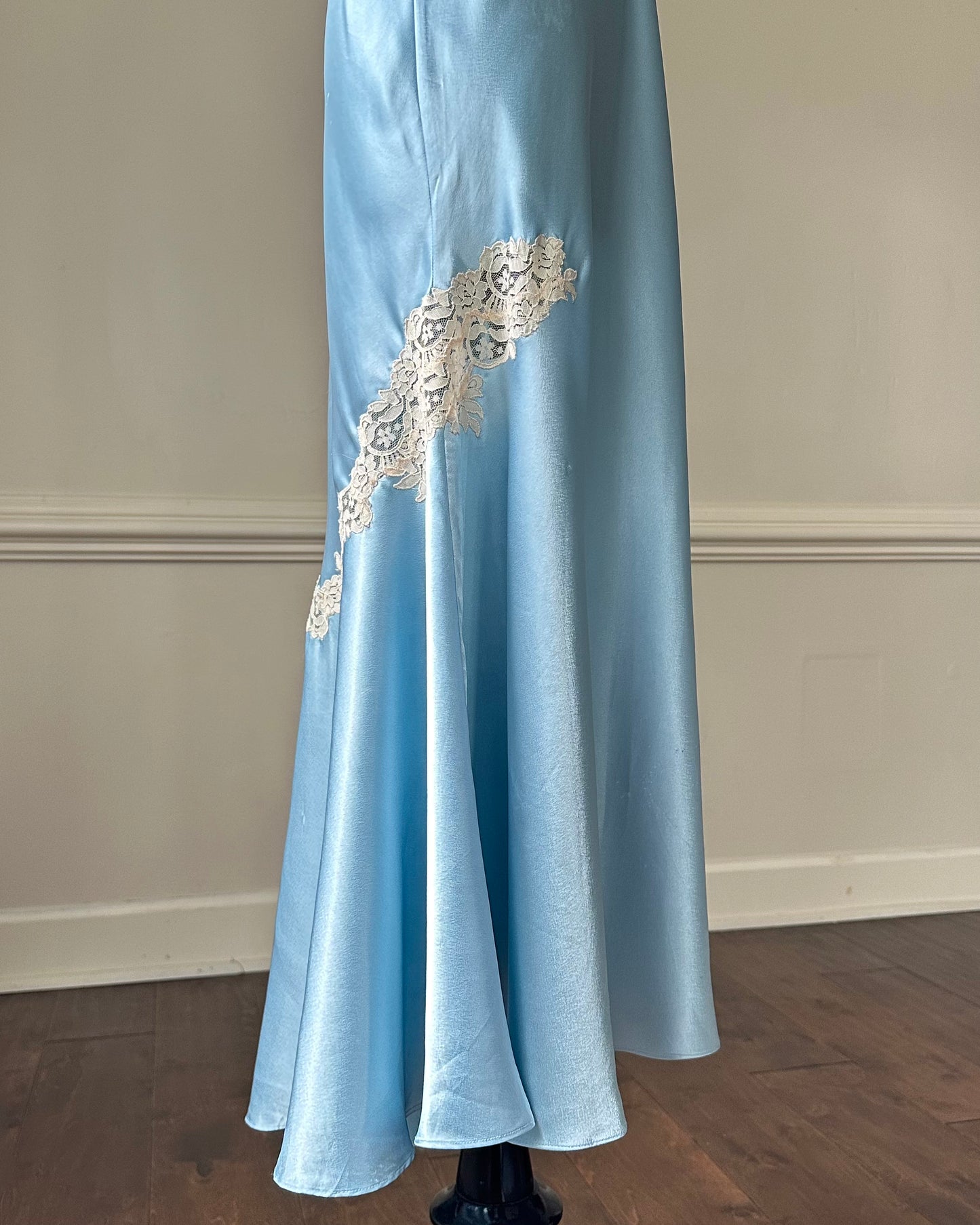 Ethereal sky blue satin maxi dress featuring rosettes embroidery bust